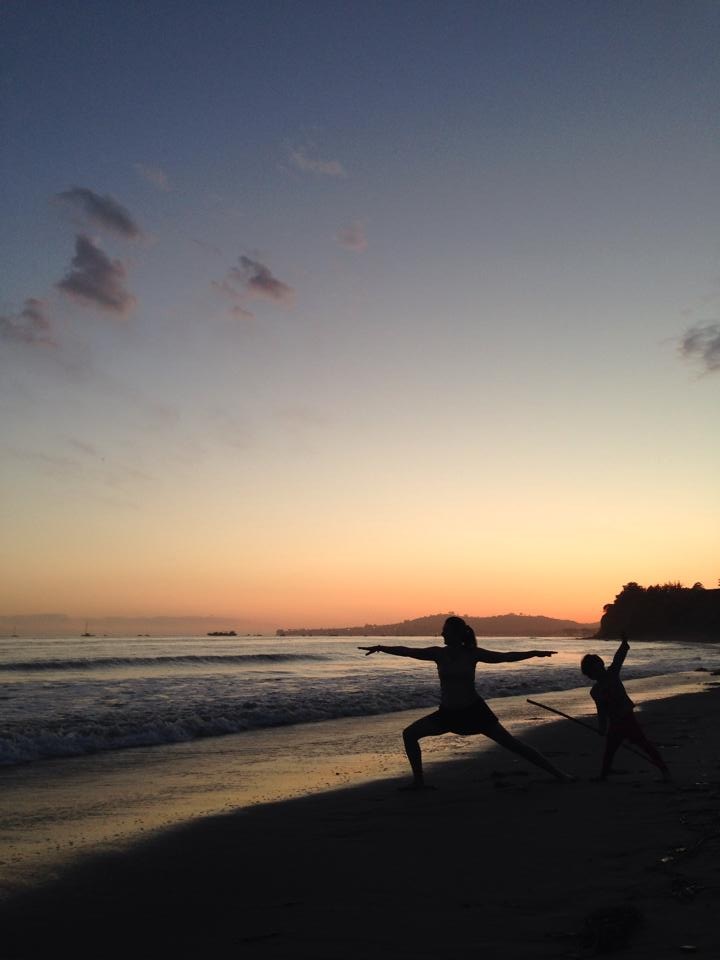 Warrior pose with Miss 4 at Butterfly Beach